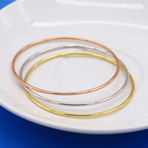 Minimalist 925 Sterling Silver Ultra-Slim 2mm Hoop Bracelet in sterling silver, gold-plated or rose gold-plated finishes. Buy from 100Sterling.com