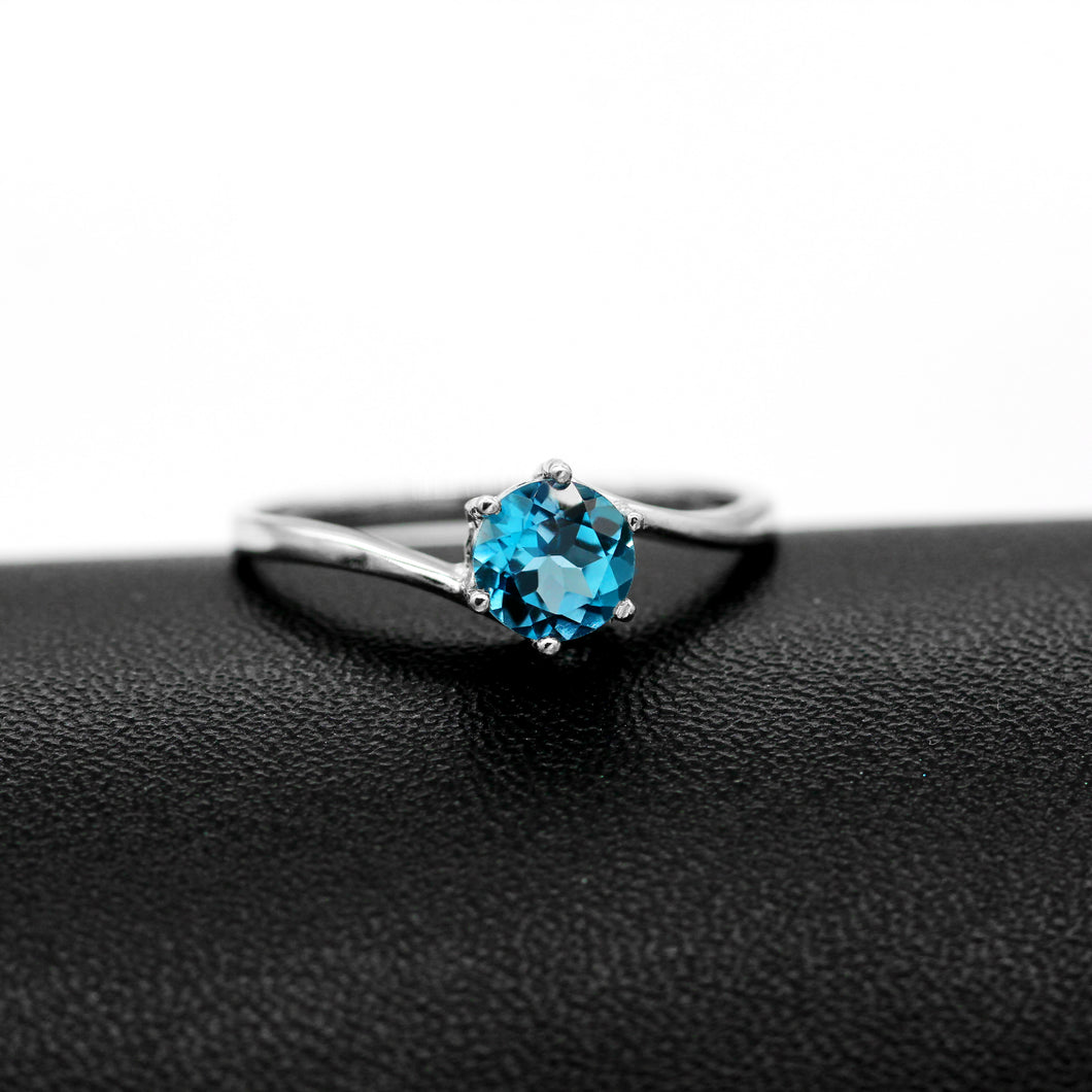 Beatrice's Contemporary .84 Carat Blue Topaz & Sterling Silver Ring