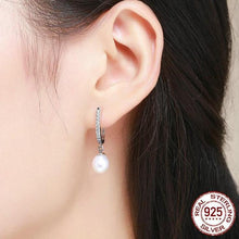 Load image into Gallery viewer, Dangling Freshwater Pearl Sterling Silver & Cubic Zirconia Earrings