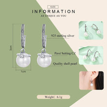 Load image into Gallery viewer, Dangling CZ &amp; Sterling Silver Shell Pearl Earrings