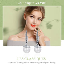 Load image into Gallery viewer, Dangling CZ & Sterling Silver Shell Pearl Earrings