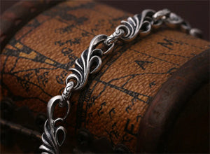 Genuine 925 Sterling Silver Bracelet with vine design chain and toggle clasp. Buy from 100sterling.com.