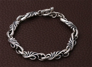 Genuine 925 Sterling Silver Bracelet with vine design chain and toggle clasp. Buy from 100sterling.com.