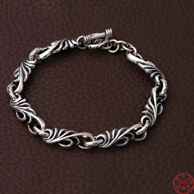 Genuine 925 Sterling Silver Bracelet with vine design chain and toggle clasp. Buy from 100sterling.com.