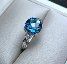Load image into Gallery viewer, Brooklynn&#39;s Sterling Silver Radiant 1.2 Carat Blue Topaz and CZ Ring, Blue Topaz, Blue Topaz Ring, Blue Topaz Birthstone, Blue Topaz Birthstone Ring, Blue Topaz and Sterling Silver, Birthday Ring, December Birthstone, December Birthstone Ring, 100Sterling.com