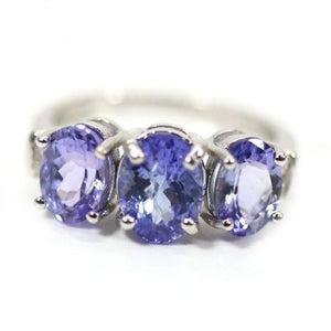 Genuine Three Stone Tanzanite Ring with a Sterling Silver Setting