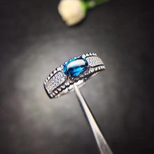 Load image into Gallery viewer, Bonny 0.76 Carat Oval Blue Topaz &amp; Cubic Zirconia Sterling Silver Ring, Blue Topaz, Blue Topaz Ring, Blue Topaz Birthstone, Blue Topaz Birthstone Ring, Blue Topaz and Sterling Silver, Birthday Ring, December Birthstone, December Birthstone Ring, 100Sterling.com